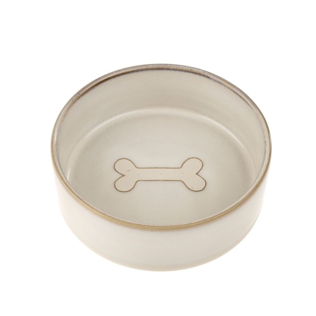 Bol pour animaux en grès blanc petit format avec détail os caché au fond, conçu pour chats et petits chiens Indaba.