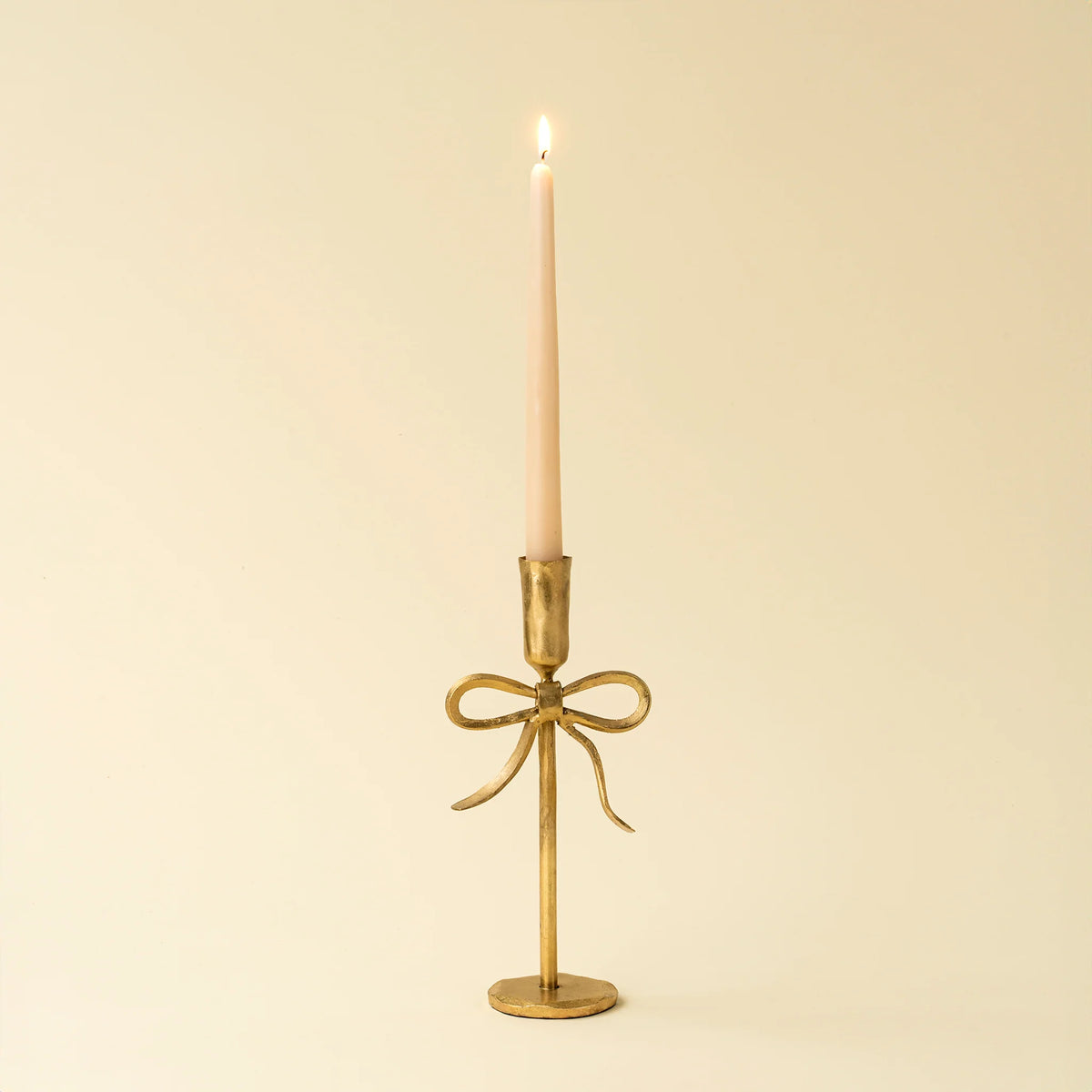 Bougeoir décoratif doré avec nœud en fer
