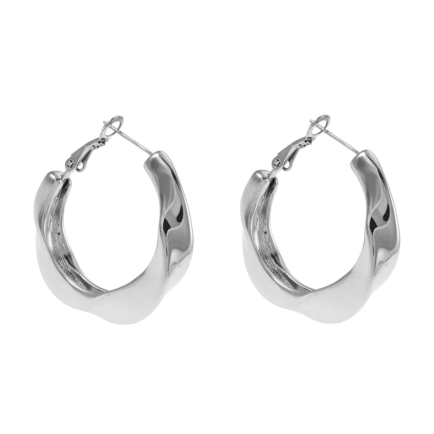Boucles d’oreilles Marfa argentées | Anneaux sculpturaux abstraits