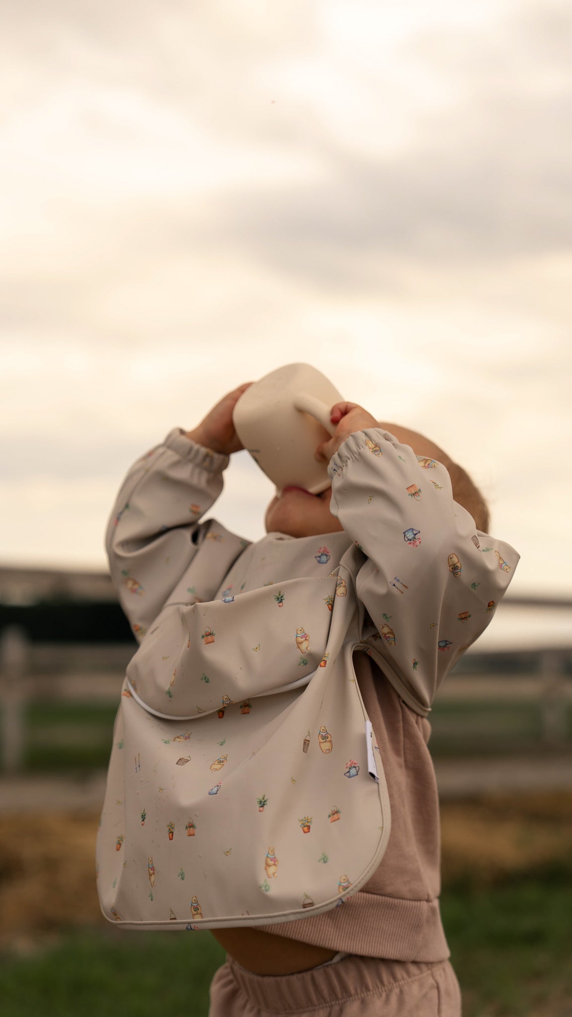 Bavette à manches longues avec pochette intégrée - Les Trouvailles de JustineBébés et tout - petitsMicassoandcoL'ourson jardineurXS - 6 - 12 mois