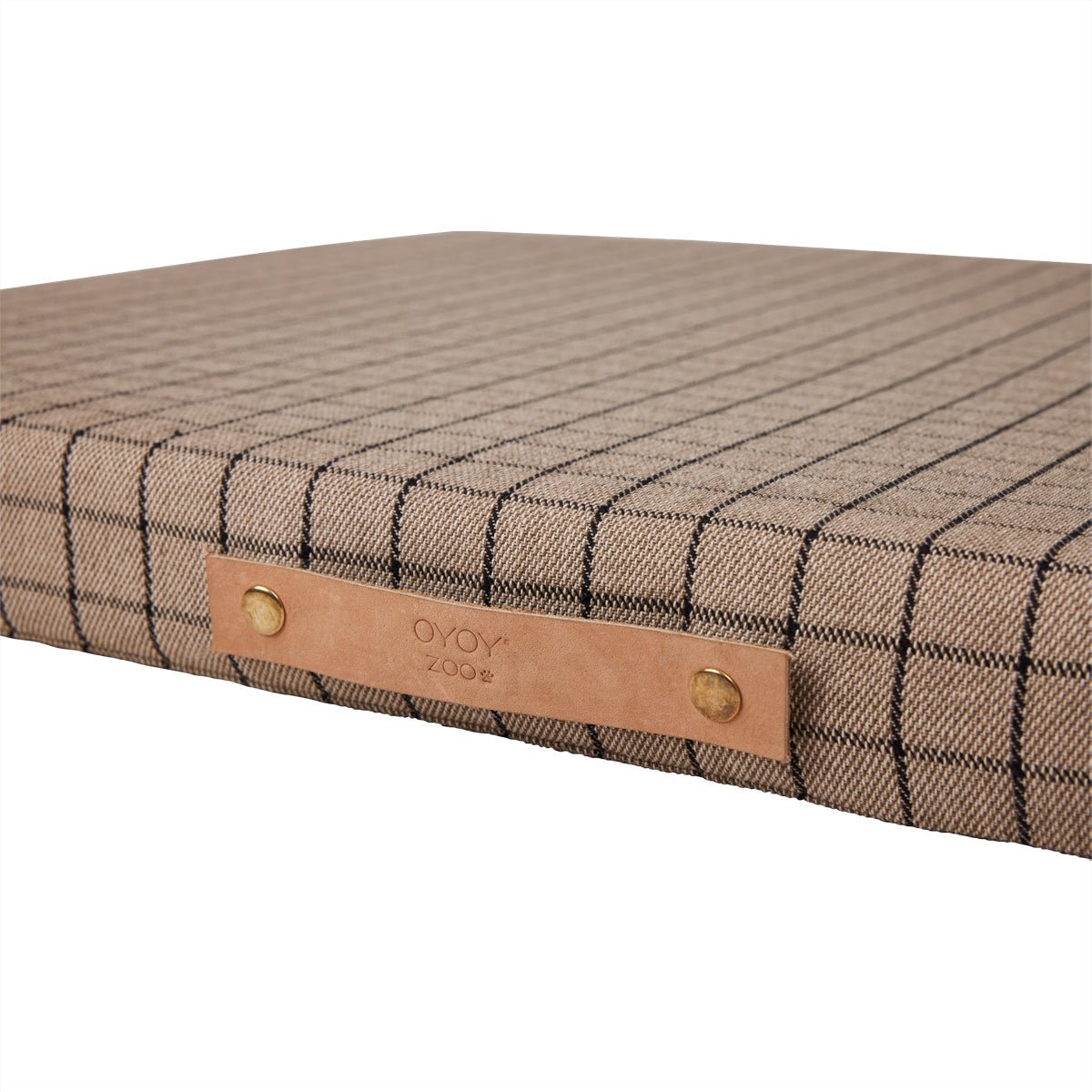 Coussin à carreaux, sangle en cuir marron avec œillets métalliques