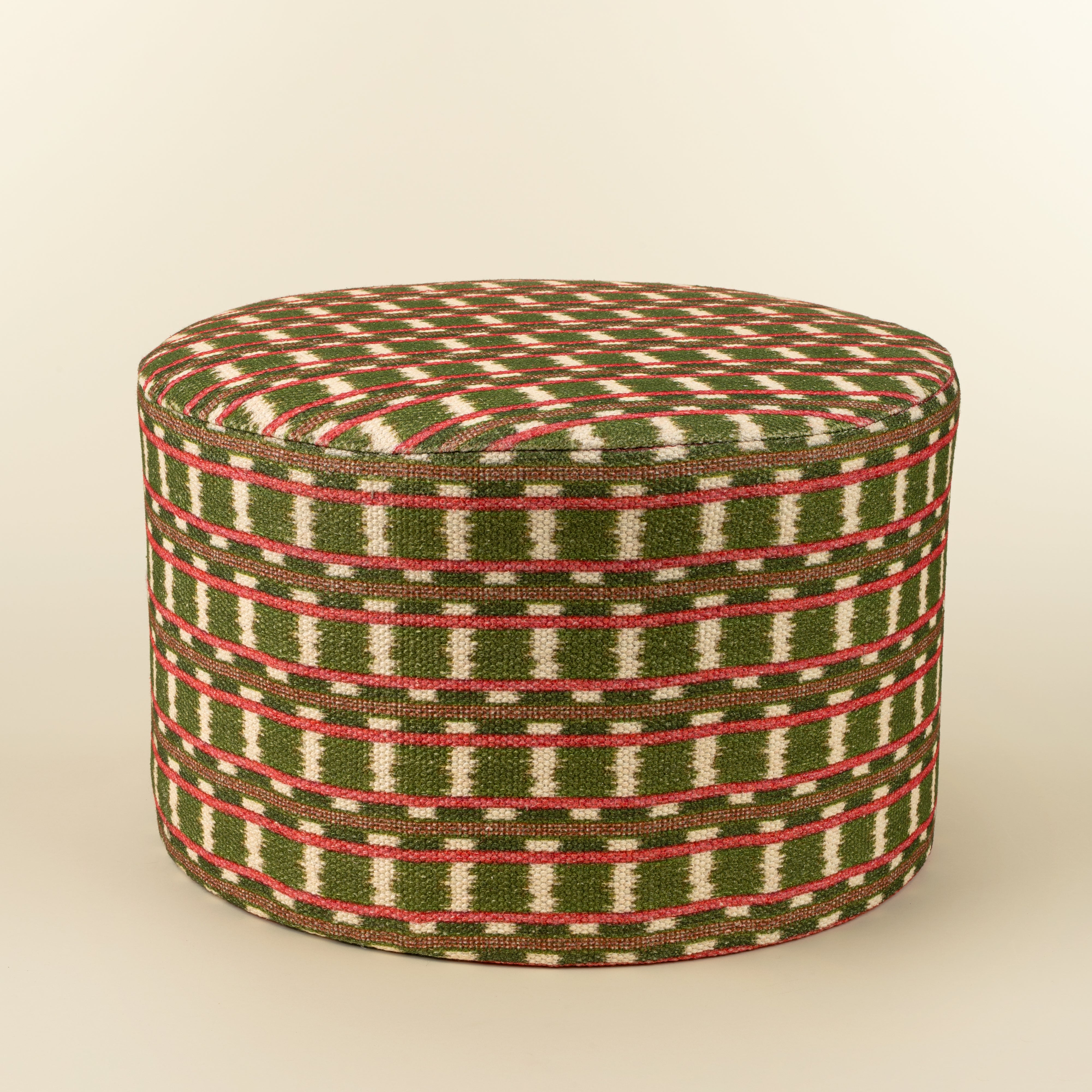 Tabouret rembourré motif ikat multicolore 