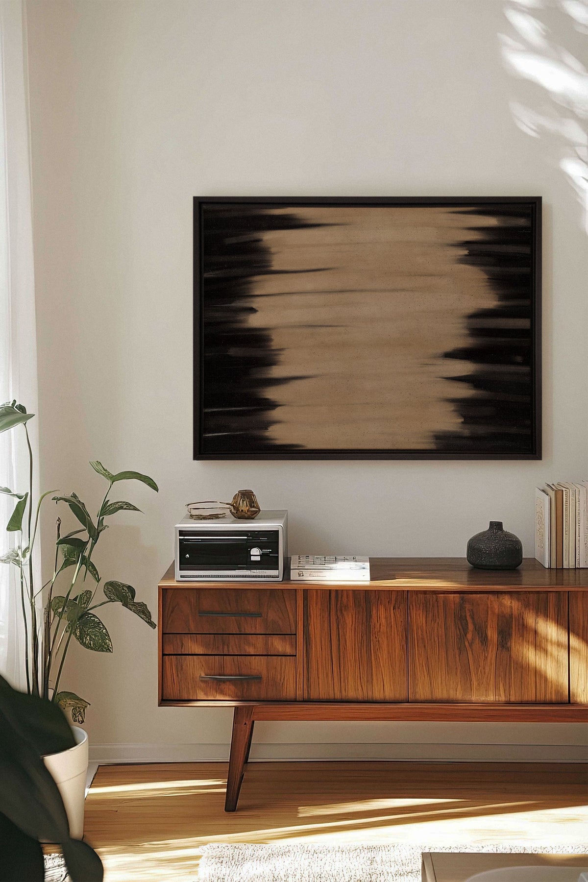 Œuvre sur toile étirée encadrée noir, abstraction noir et beige.