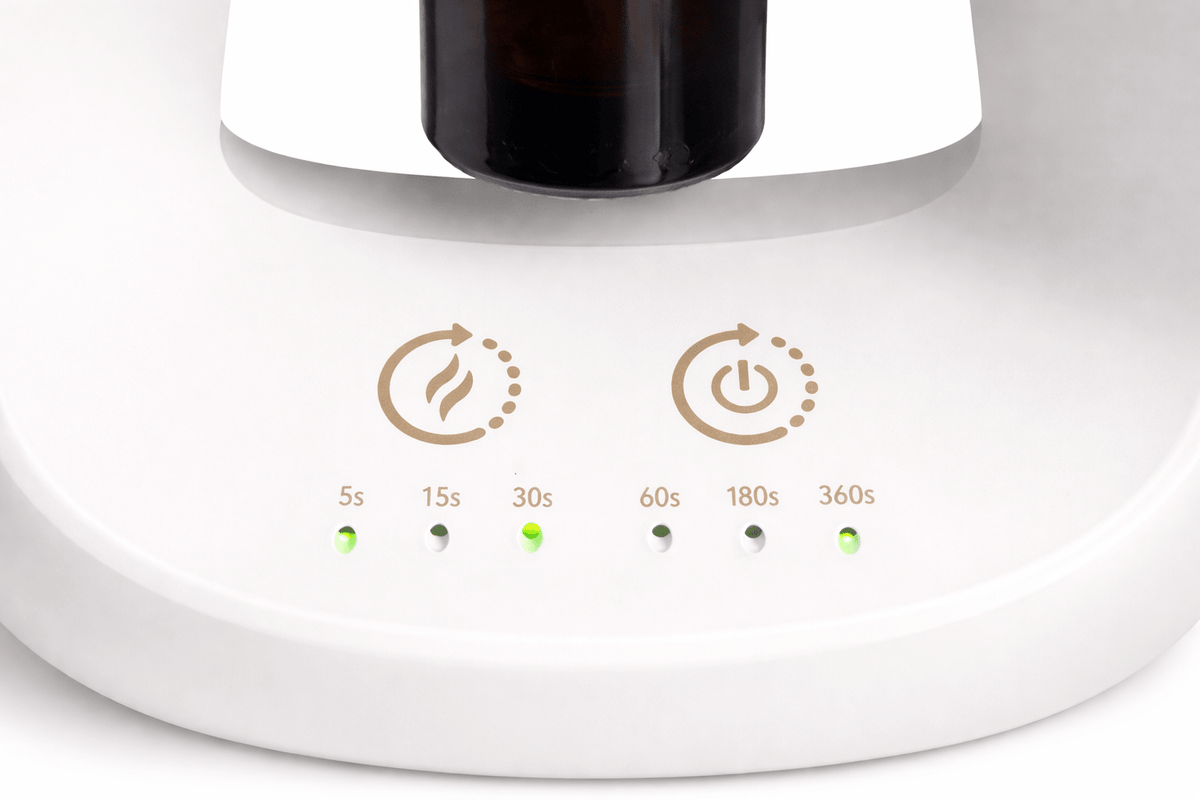 Panneau du diffuseur : icônes d’alimentation et minuteur 5 à 360 s, voyants verts