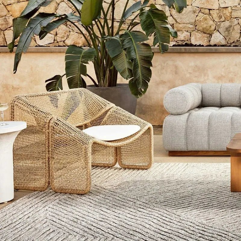 Fauteuil Raunji | Corde tressée & rotin | Design sculptural et léger - Les Trouvailles de JustineNisu Home