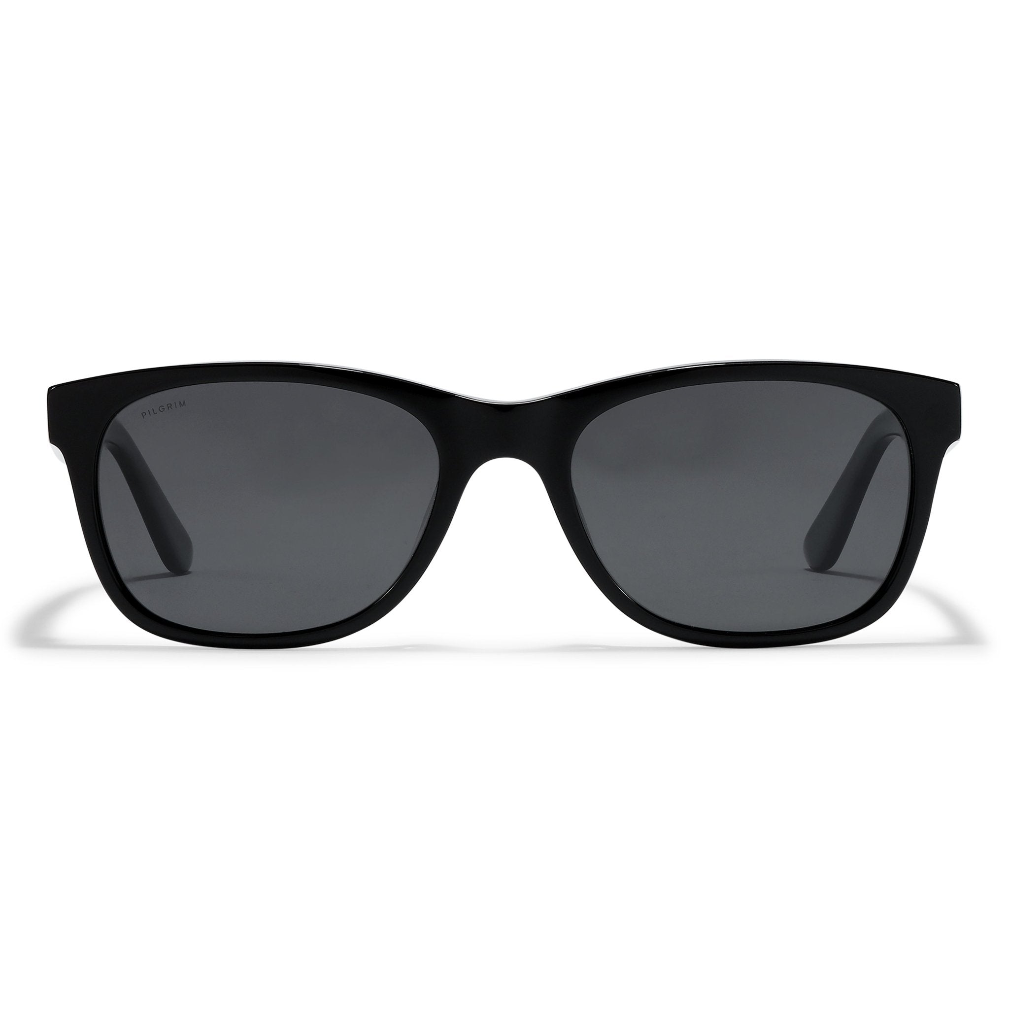 Lunettes de soleil noires à verres fumés, monture mate forme légèrement cat-eye