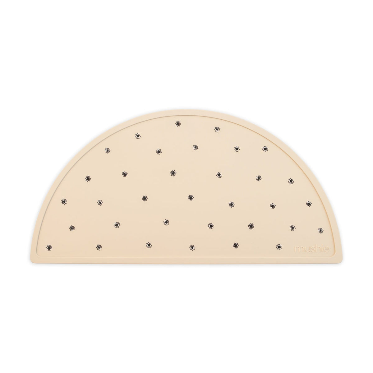 Napron de table en silicone beige avec petites étoiles noires, forme arrondie
