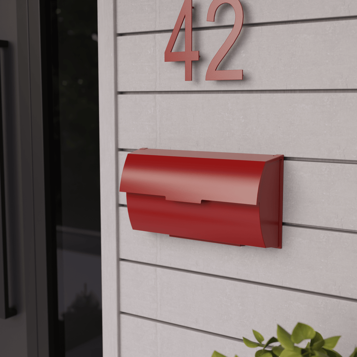 Boîte aux lettres horizontale rouge, vue rapprochée de la façade et de l’ouverture