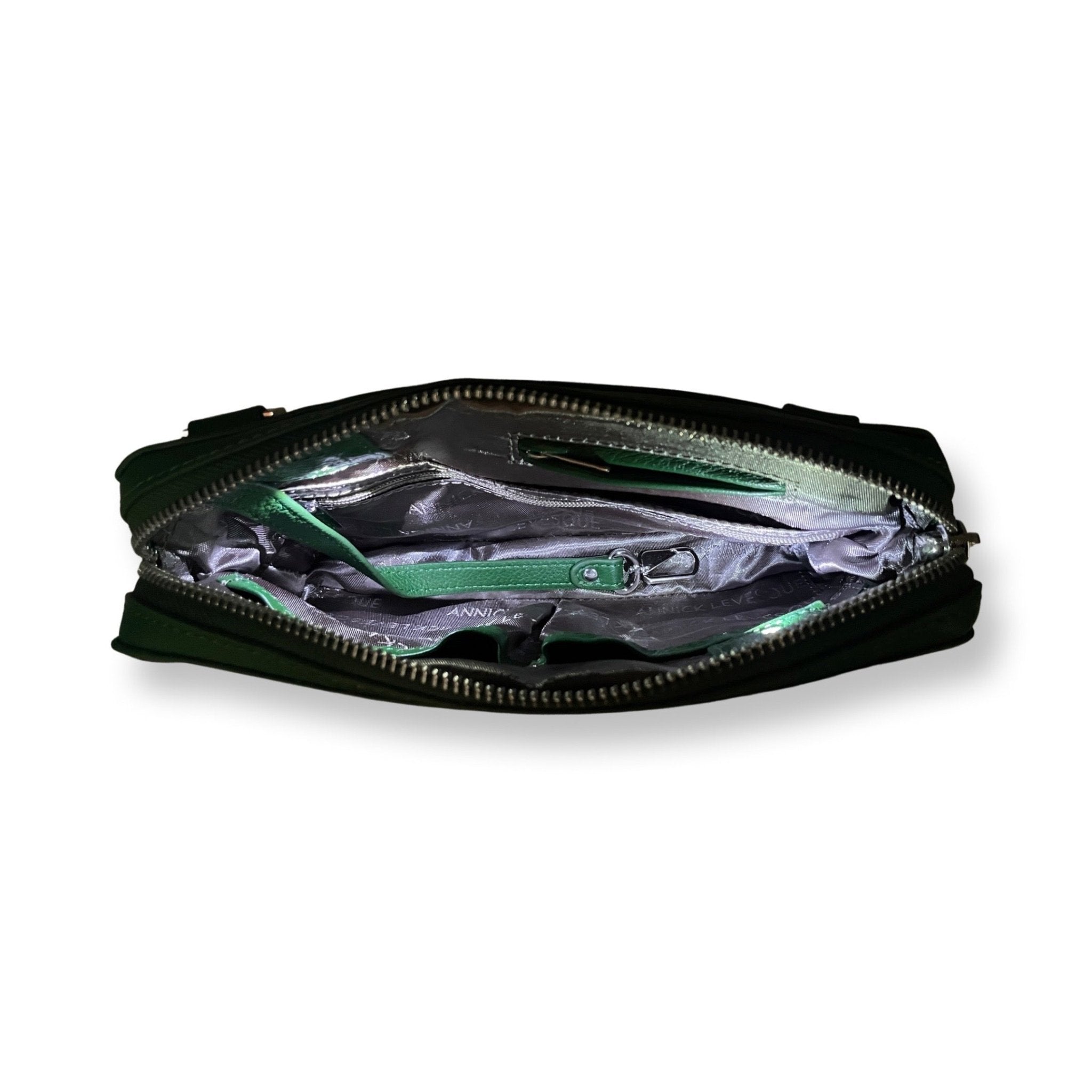 Petit sac bandoulière en cuir vert foncé, ouverture zippée et doublure intérieure