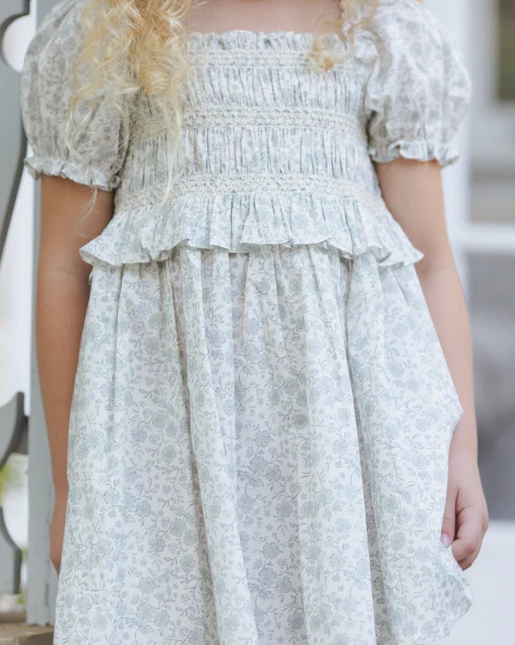 Robe bébé en coton ivoire à fleurs, manches bouffantes et volant froncé