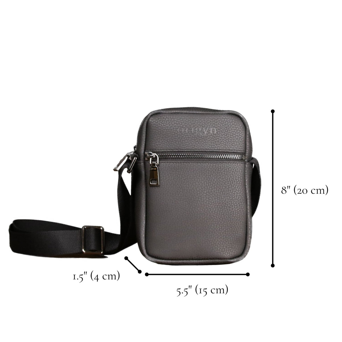 Sac bandoulière noir rectangulaire en cuir végétal, fermeture éclair et sangle