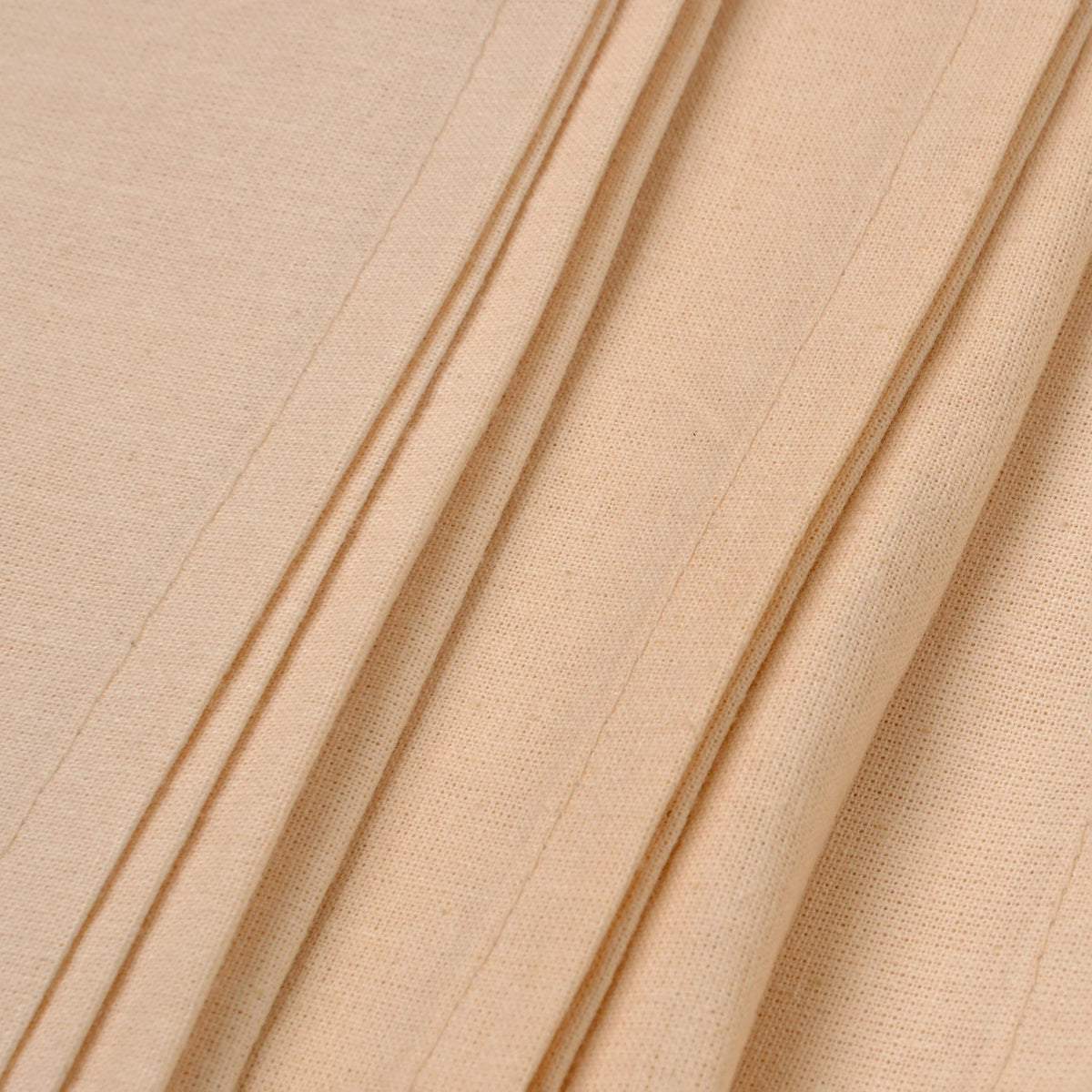 Serviettes de table en coton bio rose pâle, texture tissée visible