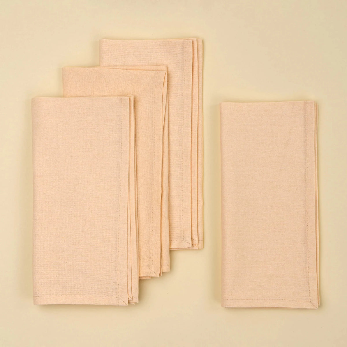 Ensemble de 4 serviettes de table en coton bio rose pâle, piles pliées
