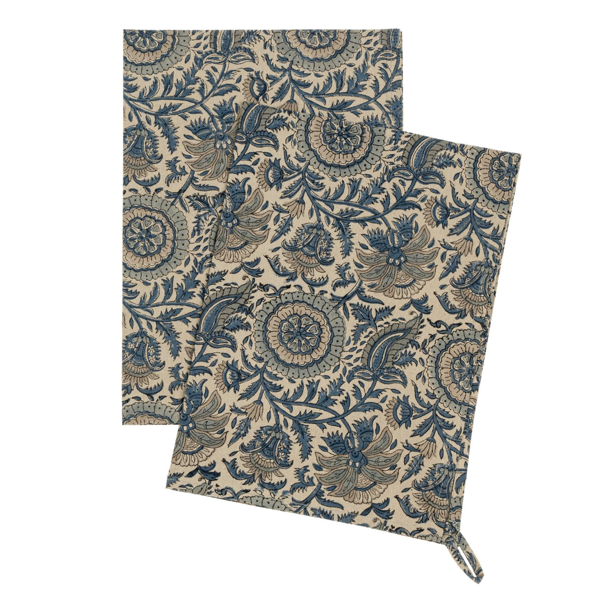 Set de 2 serviettes carrées en coton bleu marine à motifs floraux sur fond clair.