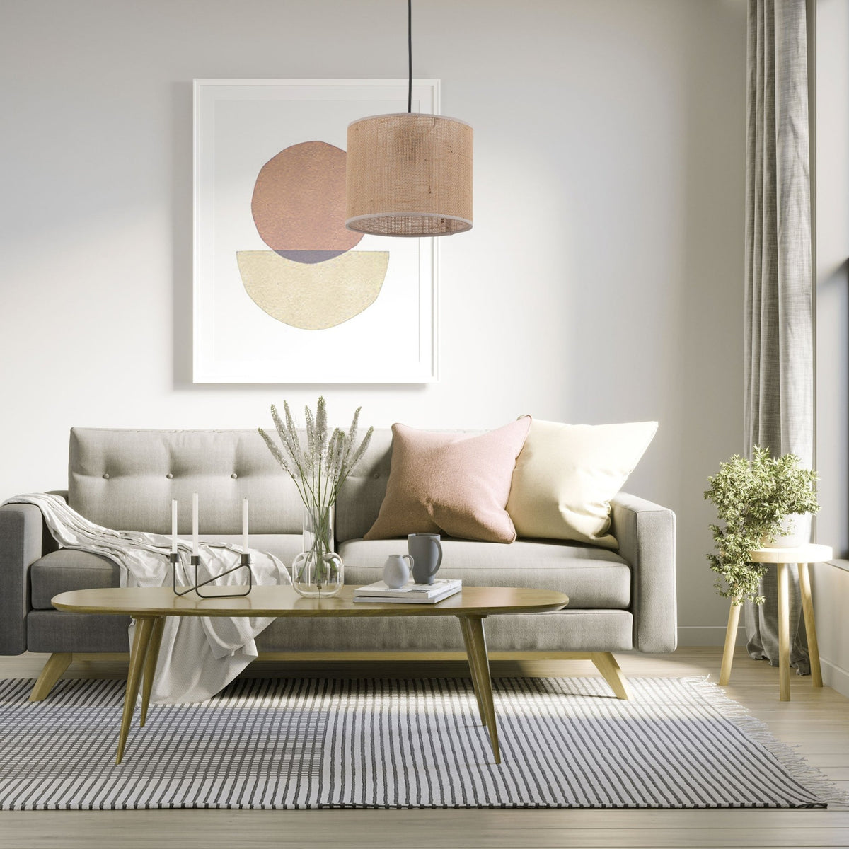Suspension en jute tressée beige au-dessus d’un salon, abat-jour cylindrique sur cordon